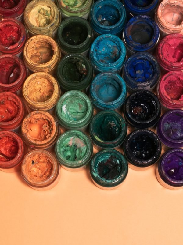 red green and blue round plastic containers