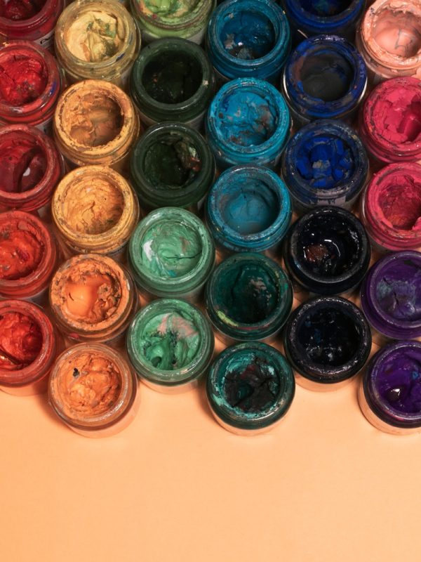 red green and blue round plastic containers
